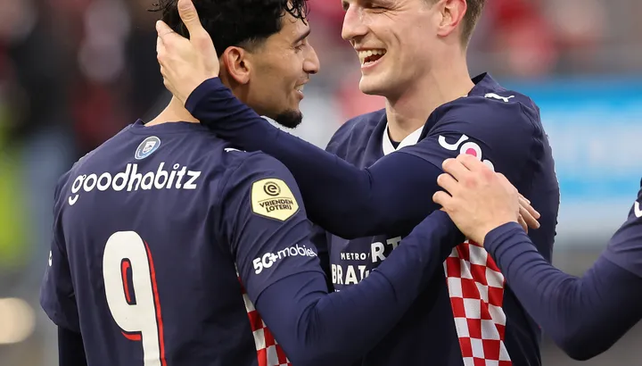 Pemain PSV Eindhoven merayakan gol di Philips Stadion saat laga Liga Belanda.